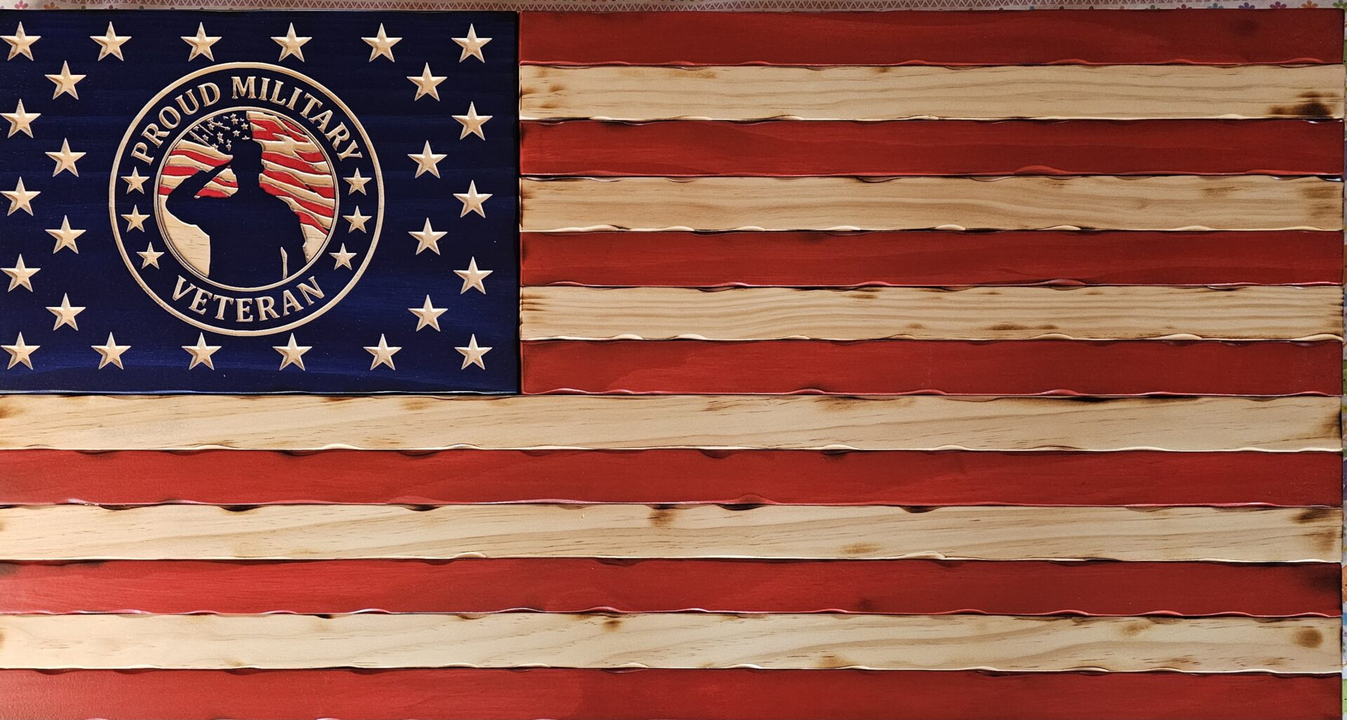 Rustic American flag made of wooden planks with a weathered look.