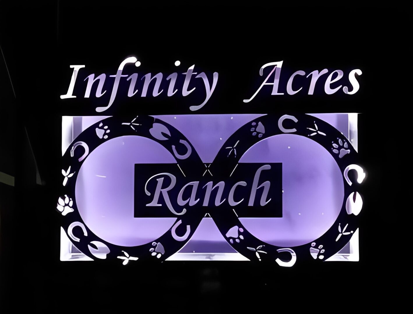 Logo reading 'Infinity Acres Ranch' with an infinity symbol background.