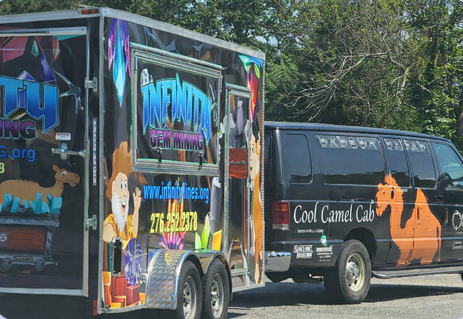 Two food trailers, one for ice cream and one for carmel corn.
